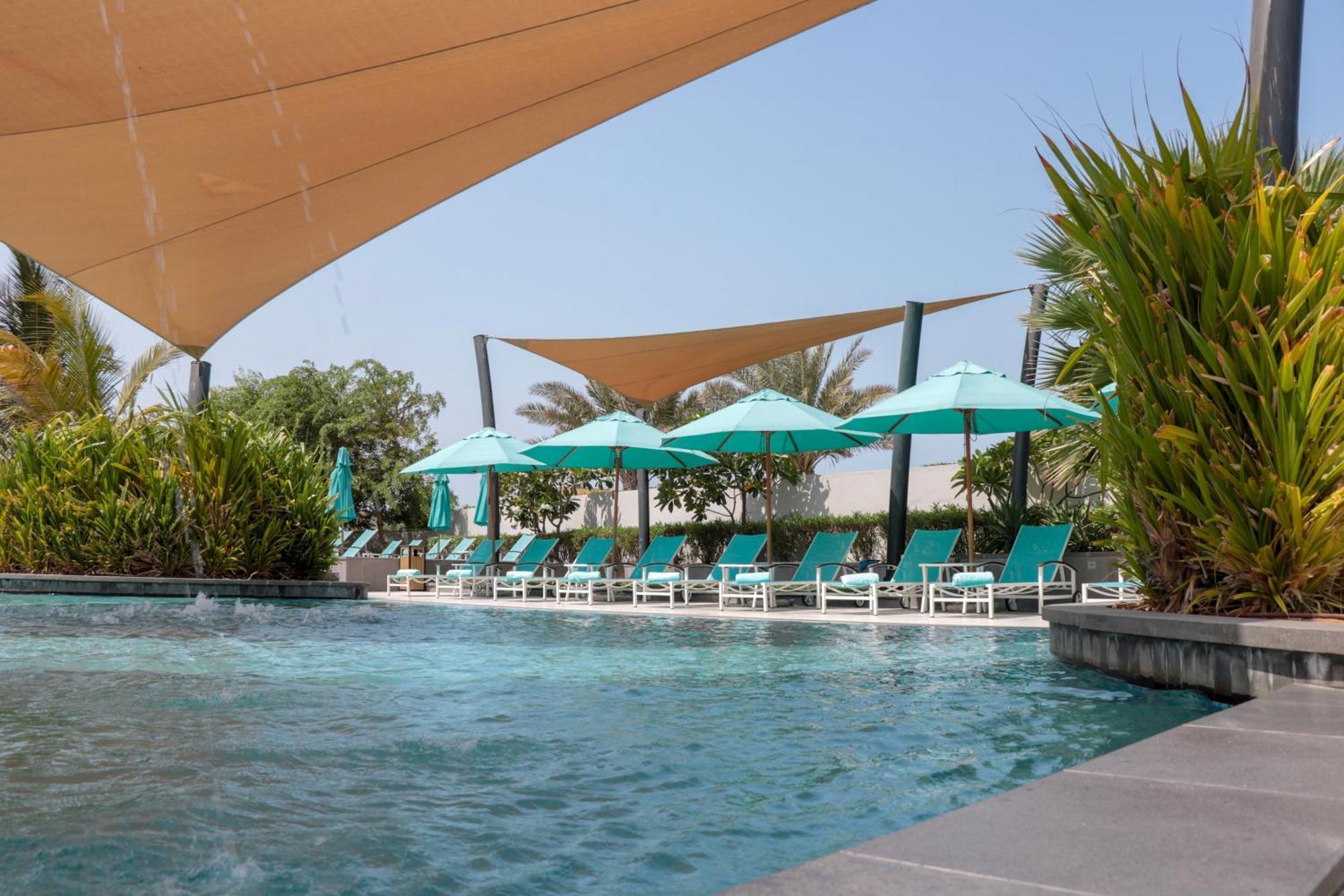 Bay La Sun Hotel And Marina - Emaar King Abdullah Economic City Exteriör bild The swimming pool at the hotel